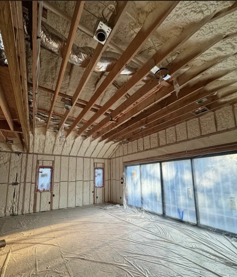 Interior walls and ceiling insulated with spray foam during new construction in Abingdon